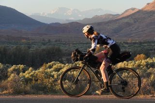 Image shows Anna cycling on the N9 mountain pass in Morocco