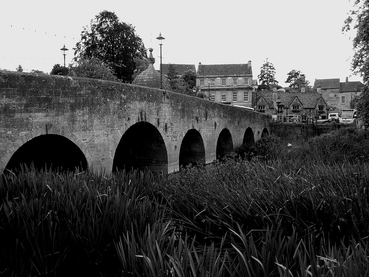 Photograph of a bridge over the River Avon, taken with Camp Snap 2, image is monochrome and fairly contrasty