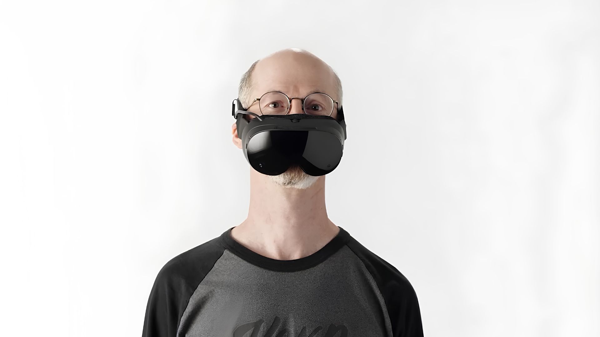 A man wearing the Steam Frame halfway down his face