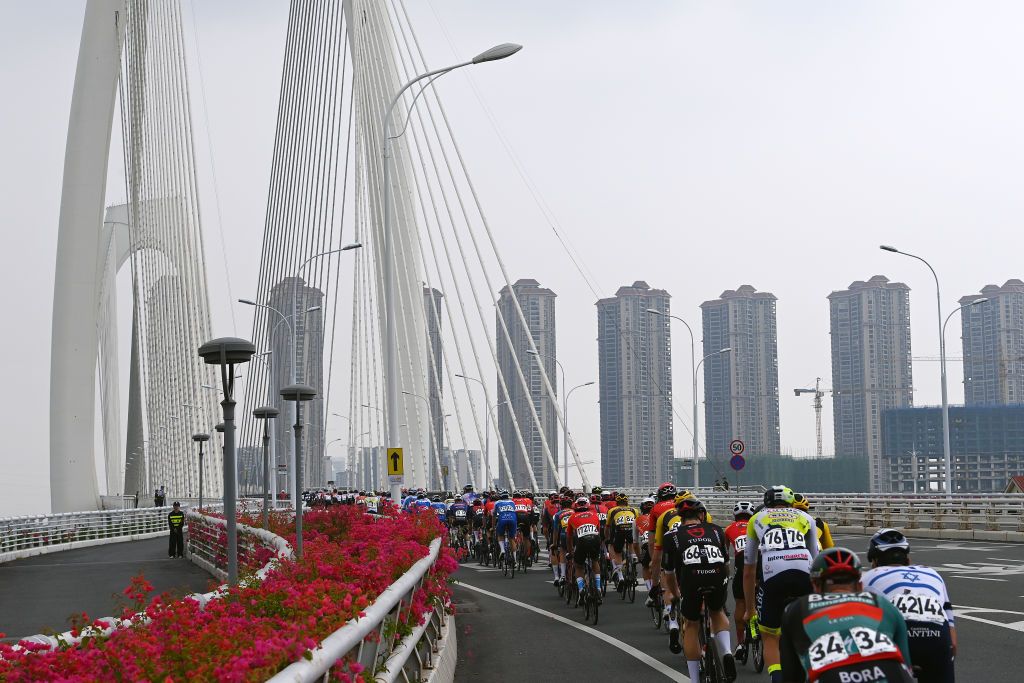 NANNING CHINA OCTOBER 14 A general view of the peloton passing through Nanning city during the 4th GreeTour of Guangxi 2023 Stage 3 a 1343km stage from Nanning to Nanning UCIWT on October 14 2023 in Nanning China Photo by Tim de WaeleGetty Images