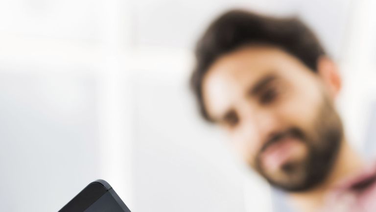 Finger, Facial hair, Electronic device, Portable communications device, Communication Device, Gadget, Jaw, Beard, Mobile device, Mobile phone,