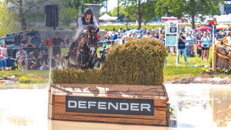 US World Championship team members Will Coleman and Diabolo jump a fence in water at Kentucky 2025.