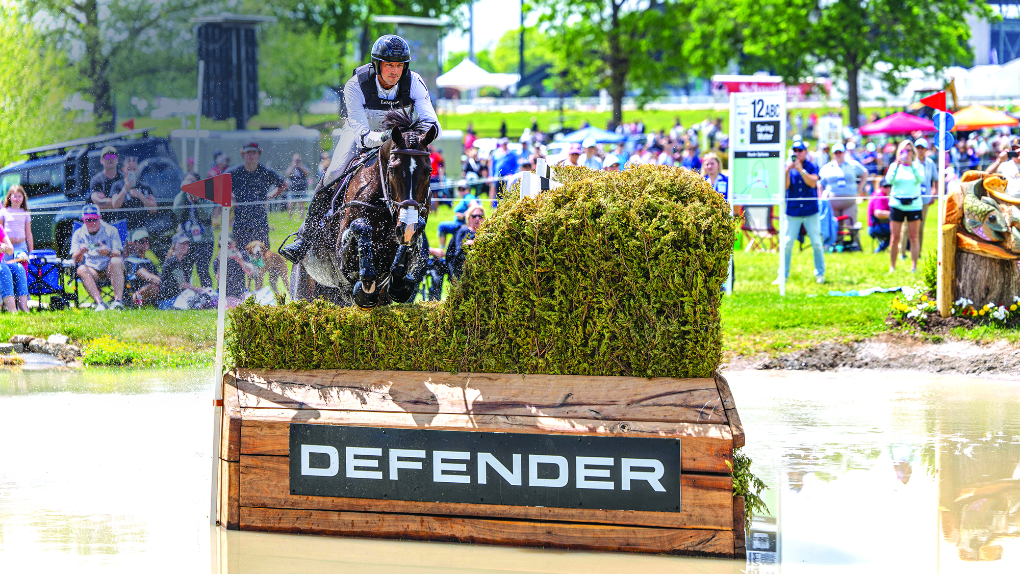 US World Championship team members Will Coleman and Diabolo jump a fence in water at Kentucky 2025.