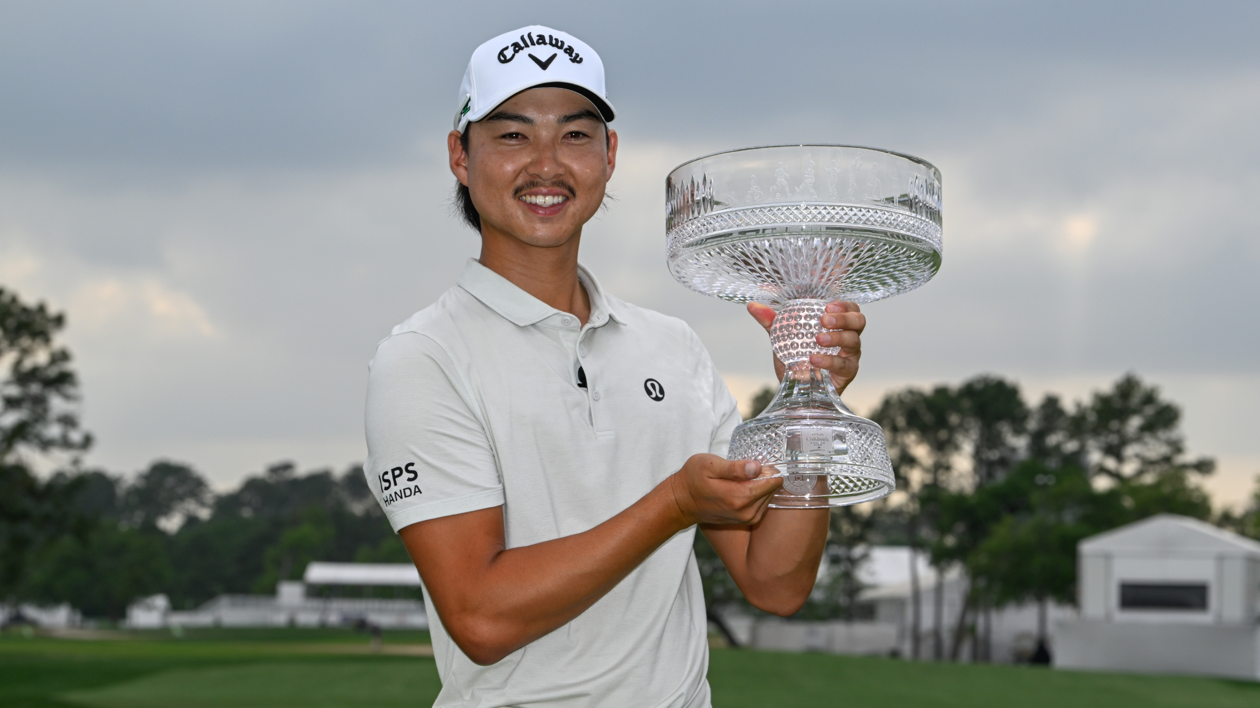 Min Woo Lee with the Texas Children's Houston Open trophy