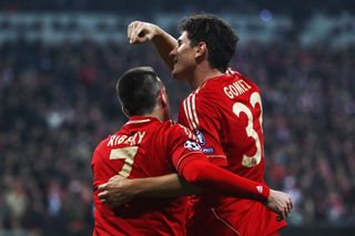 Mario Gomez celebrates with Franck Ribery after the two combine for Bayern Munich's sixth goal against Basel in the Champions League in March 2012.