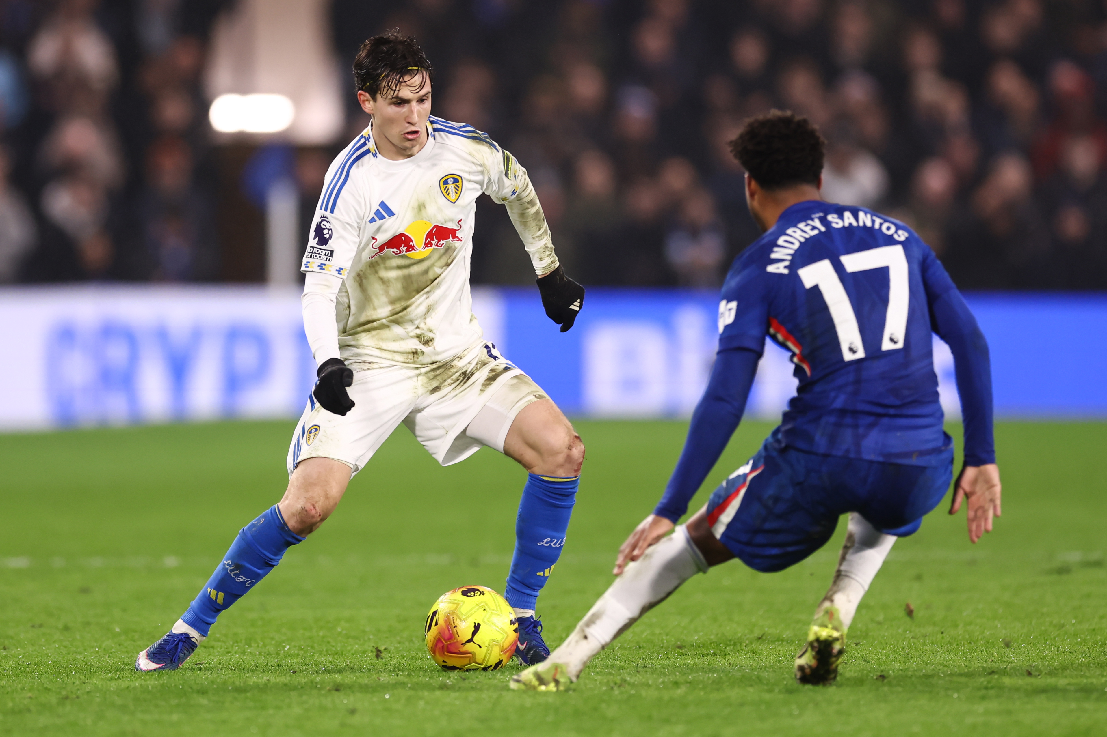 Leeds United man Brendan Aaronson squares off against Andre Santos