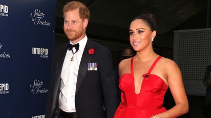 Prince Harry and Meghan Markle in black tie at a gala