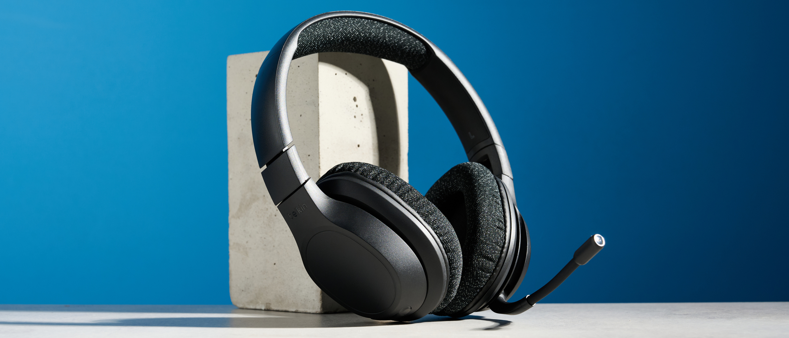 A black Belkin SoundForm Adapt wireless headset