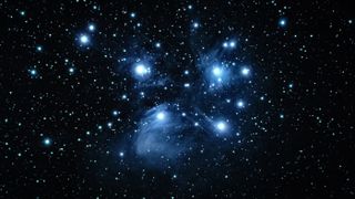 A picture of Messier 45, known as the pleiades star cluster or the Seven Sisters.