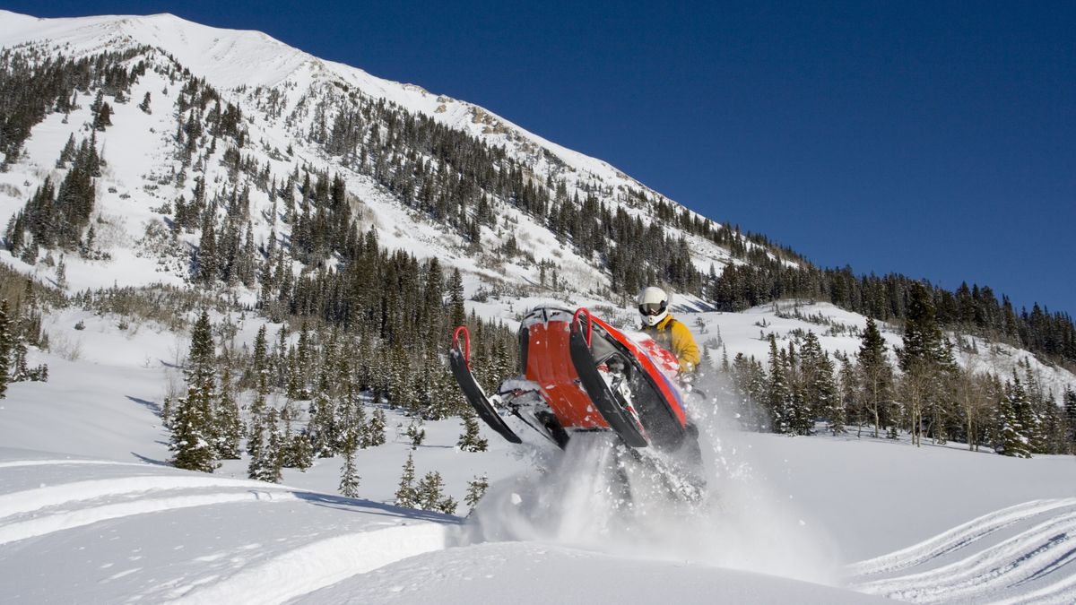 Snowmobiling in the mountains