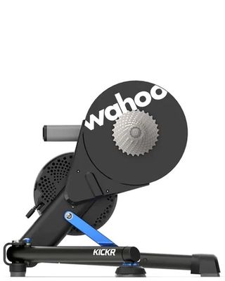 A Wahoo Kickr V6 turbo trainer standing against a white background