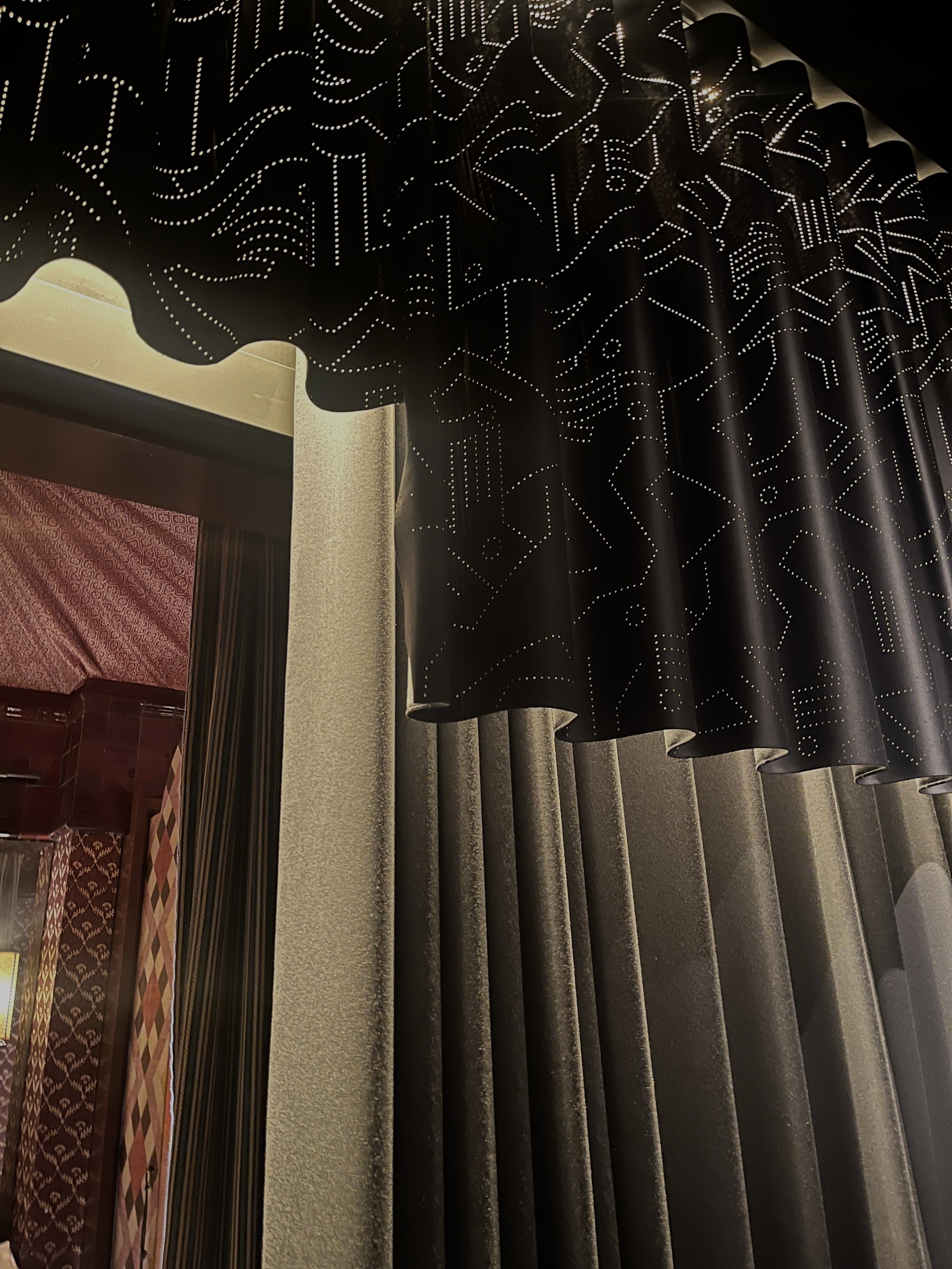 close up of curtain detail with perforated design