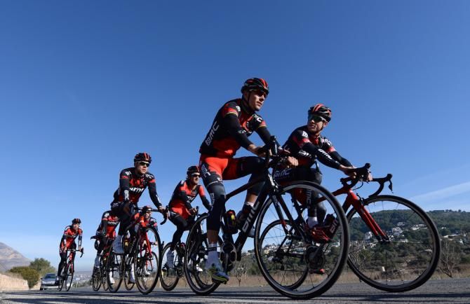 Philippe Gilbert and Martin Kohler talk while out riding
