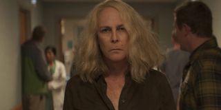 Laurie Strode (Jamie Lee Curtis) walks down a hospital corridor in 'Halloween Kills'