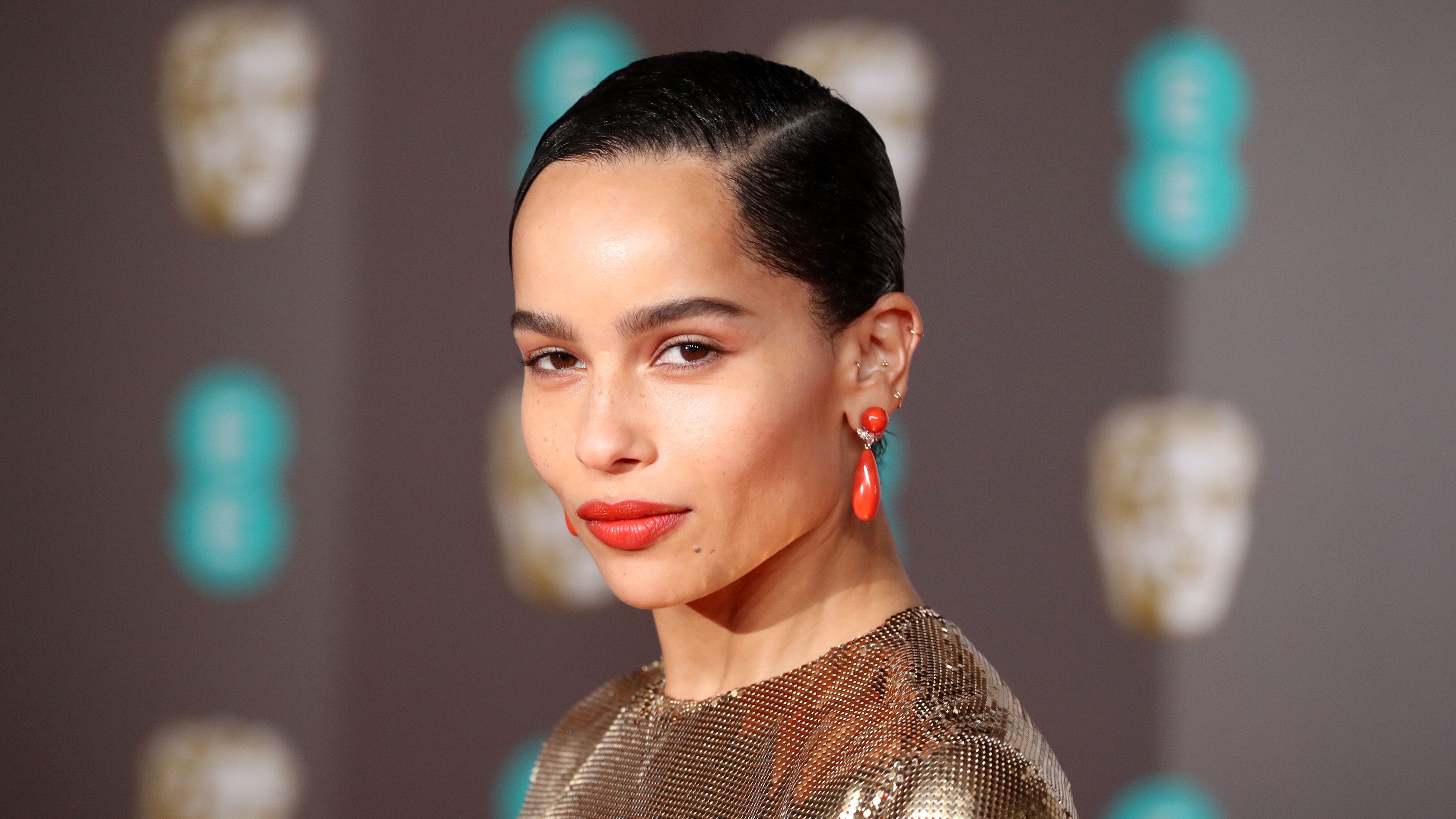 Zoe Kravitz Styled a Band Tee With a Pleated Skirt and Mary-Janes ...