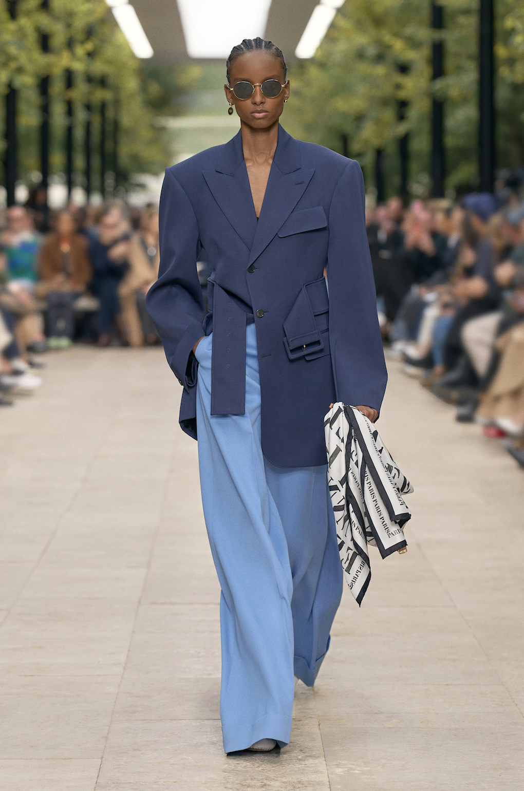 A model wore Maggie Gyllenhaal's navy blue blazer and jazz shoes on the Celine Spring 2026 runway