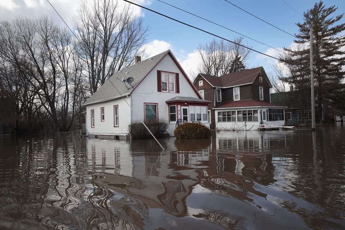 Homes are inundated by floodwater from the Pecatonica River on March 18, 2019, in Freeport, Illinois. 