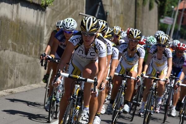 Ellen van Dijk leads a HTC - Columbia Women train at the front of the peloton as they chase down the leaders.