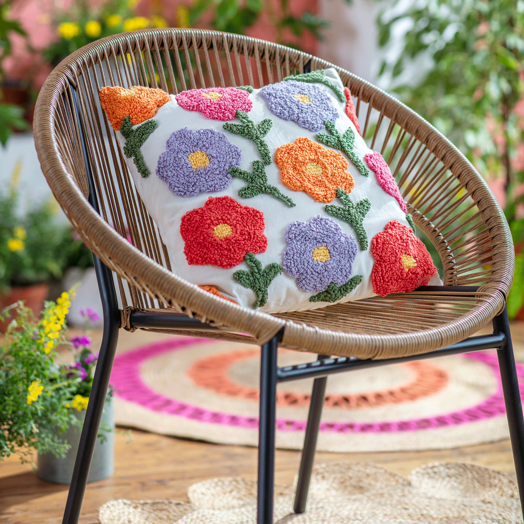 Rattan chair with flower cushion