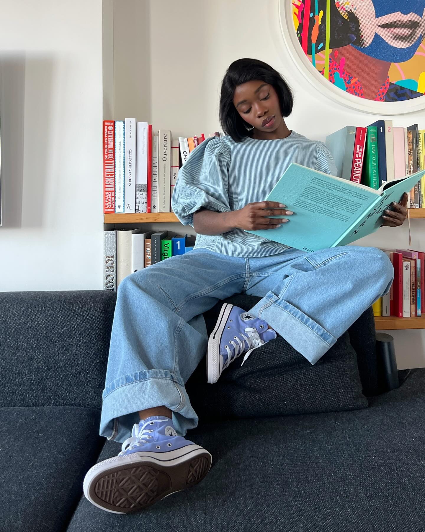 Gen Z influencer wearing canvas sneakers, a rising Gen Z sneaker trend.