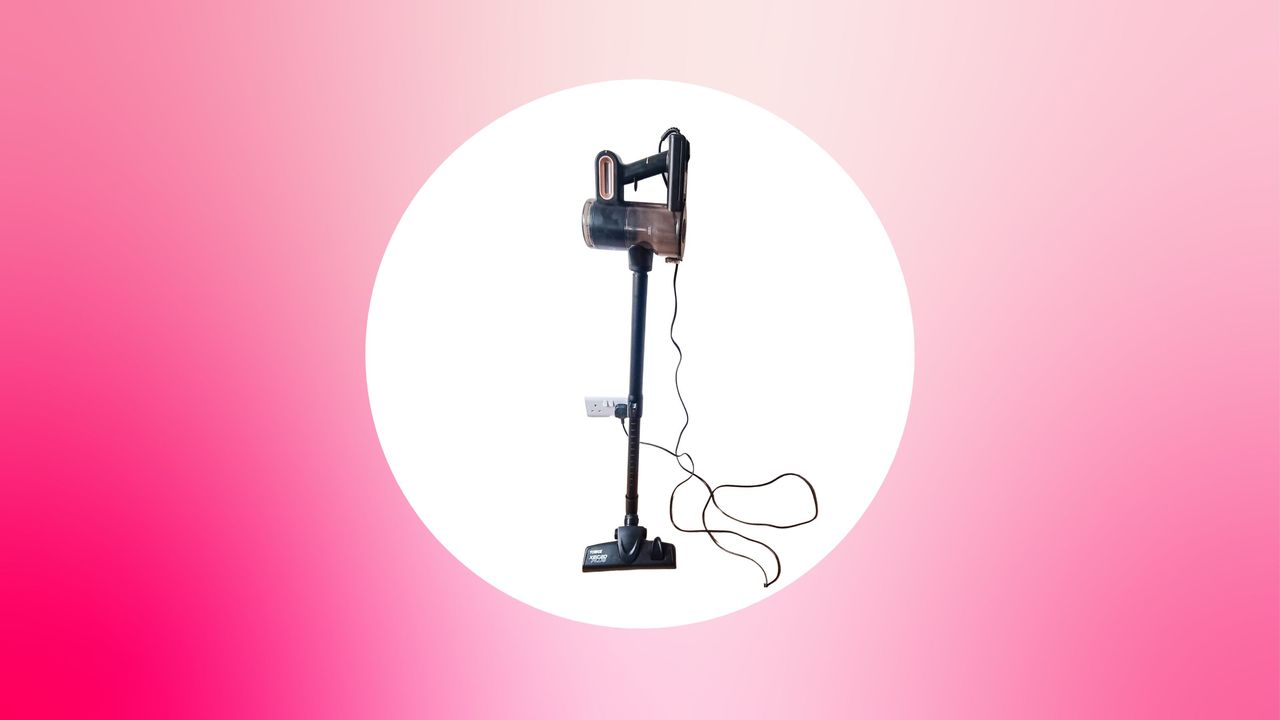 A vacuum on a pink background