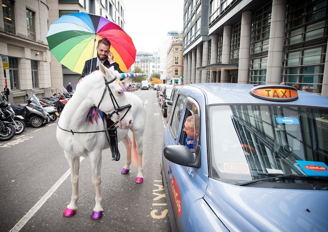 **FREE TO USE FOR SINGLE EDITORIAL PURPOSES AND NOT FOR FURTHER SYNDICATION** Three and ZTE brighten up the damp, dreary commute for Londoners with the Unicorn Cab Service to celebrate the launch of the new ZTE Blade 7. Byline John Nguyen/JNVisuals 24/10/2016