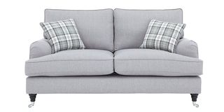 grey sofa with checkered cushions