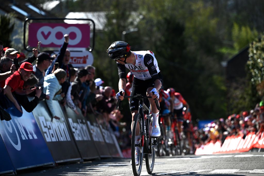 HUY BELGIUM APRIL 19 Tadej Pogaar of Slovenia and UAE Team Emirates sprint at finish line to win the 87th La Fleche Wallonne 2023 Mens Elite a 1943km one day race from Herve to Mur de Huy UCIWT on April 19 2023 in Huy Belgium Photo by David StockmanGetty Images