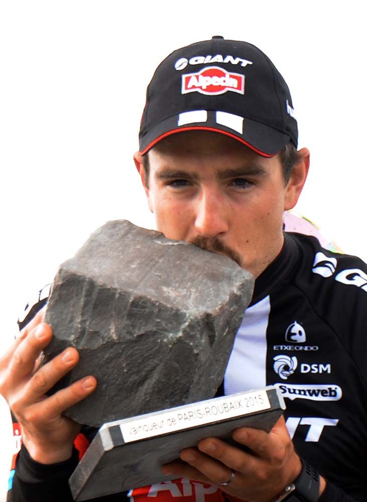 John Degenkolb (Giant-Alpecin) kisses the cobble-stone trophy