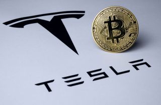 Tesla logo with bitcoin logo