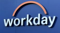 Workday logo and branding pictured on a building facade with blue background.
