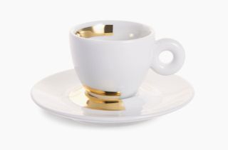 White & gold teacup