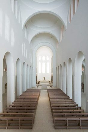 White hallway with low level lighting