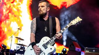 Billy Duffy of The Cult performs during the Revolution 3 Tour at Michigan Lottery Amphitheatre on July 24, 2018 in Sterling Heights, Michigan. 