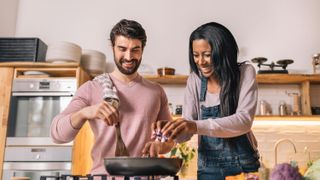 Couple cooking together