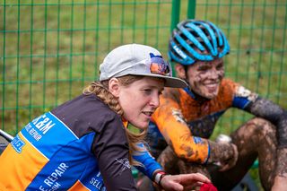Brenna Wrye-Simpson talks to her riders after the race