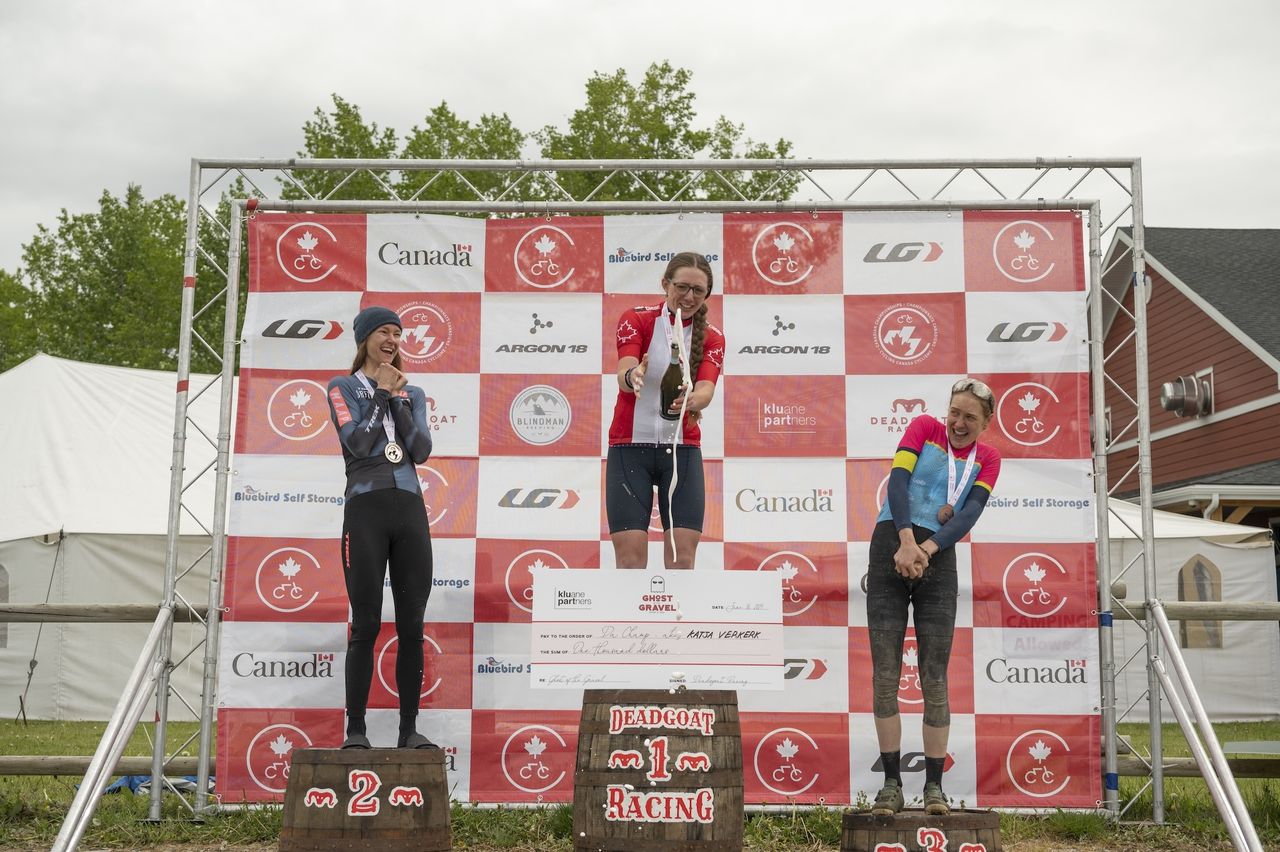Katja Verkerk celebrates elite women's victory on top step of podium at 2024 Canadian Gravel Championships at Ghost of the Gravel