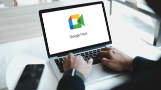 Google Meet logo on laptop 