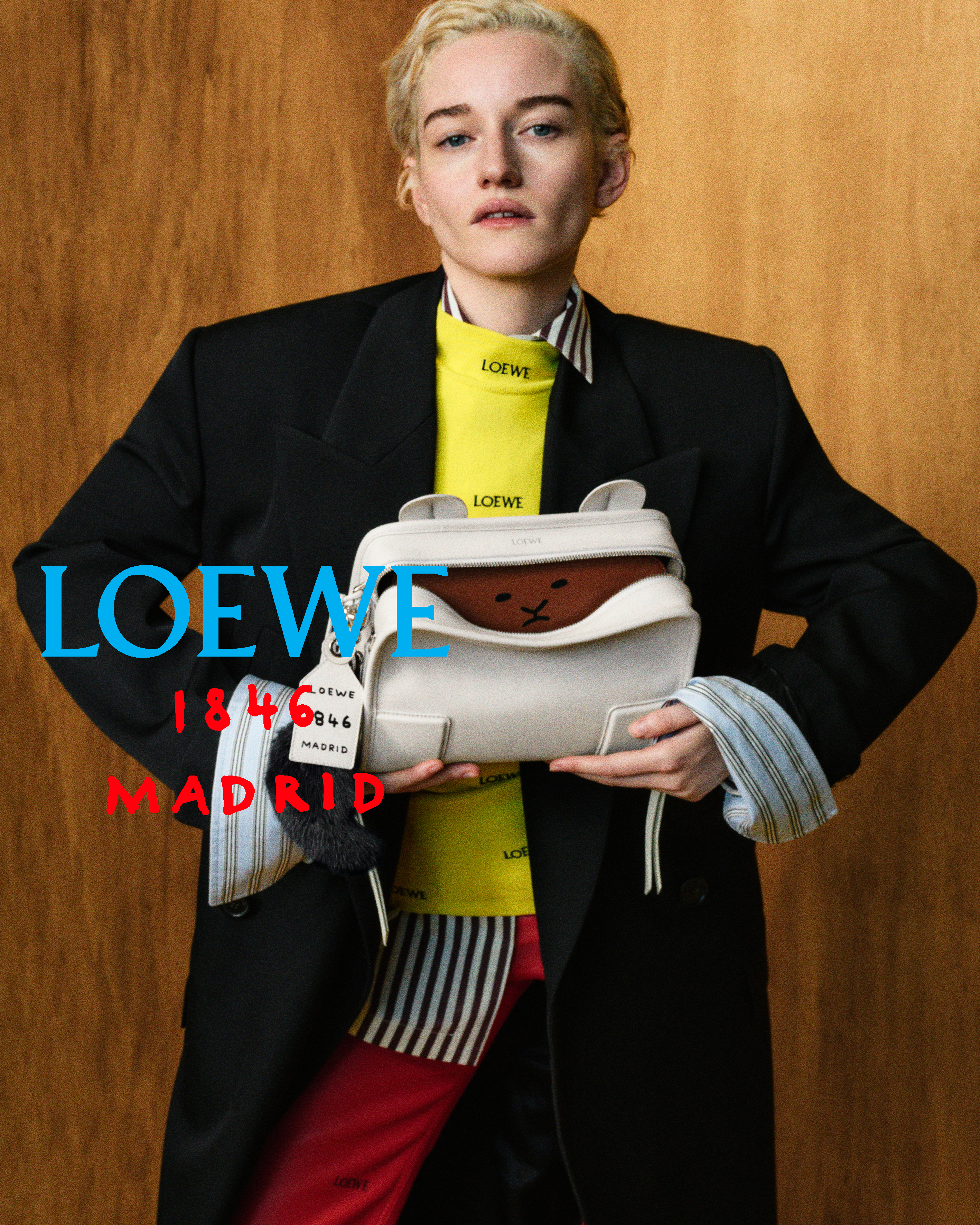 Julia Garner wears the Loewe Amazona bag.