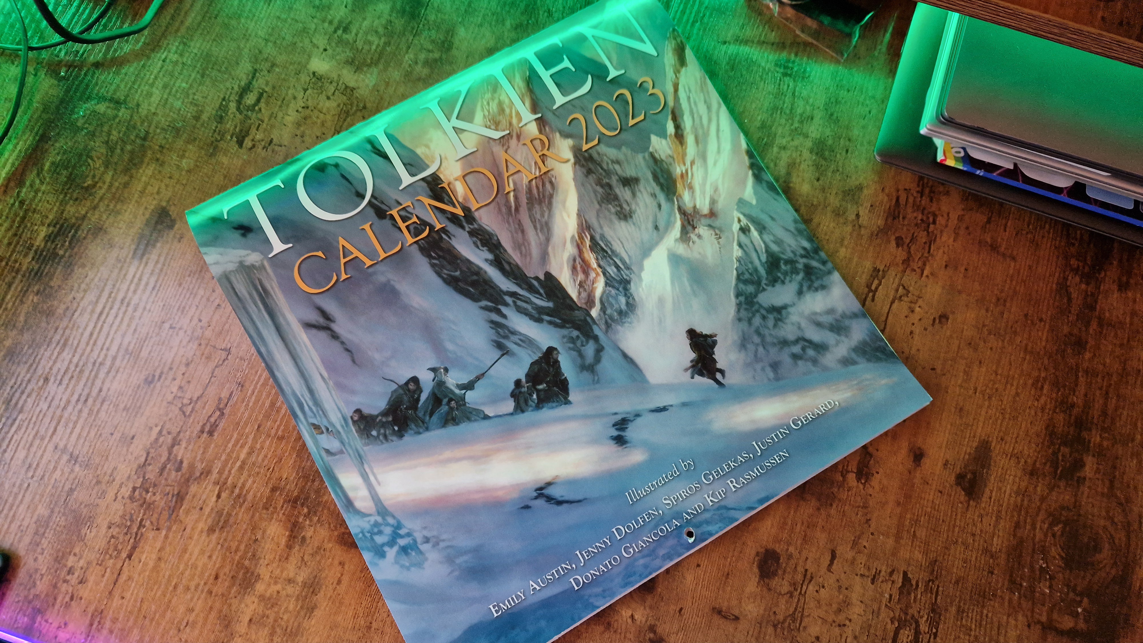 Official Tolkien Calendar 2023 photo on a wooden desk