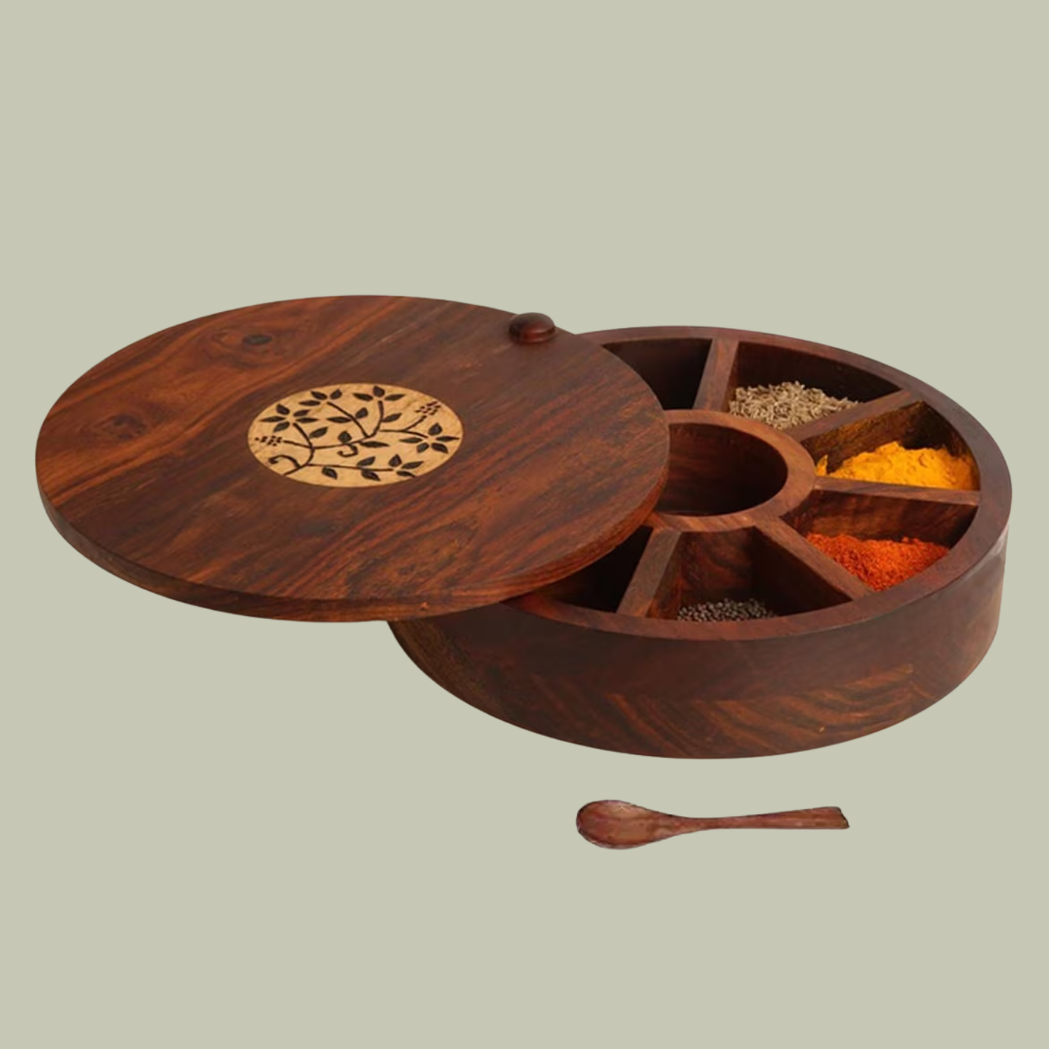 A wooden swivel lid spice box