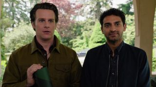 Jonathan Groff and Karan Soni in a doorway in A Nice Indian Boy