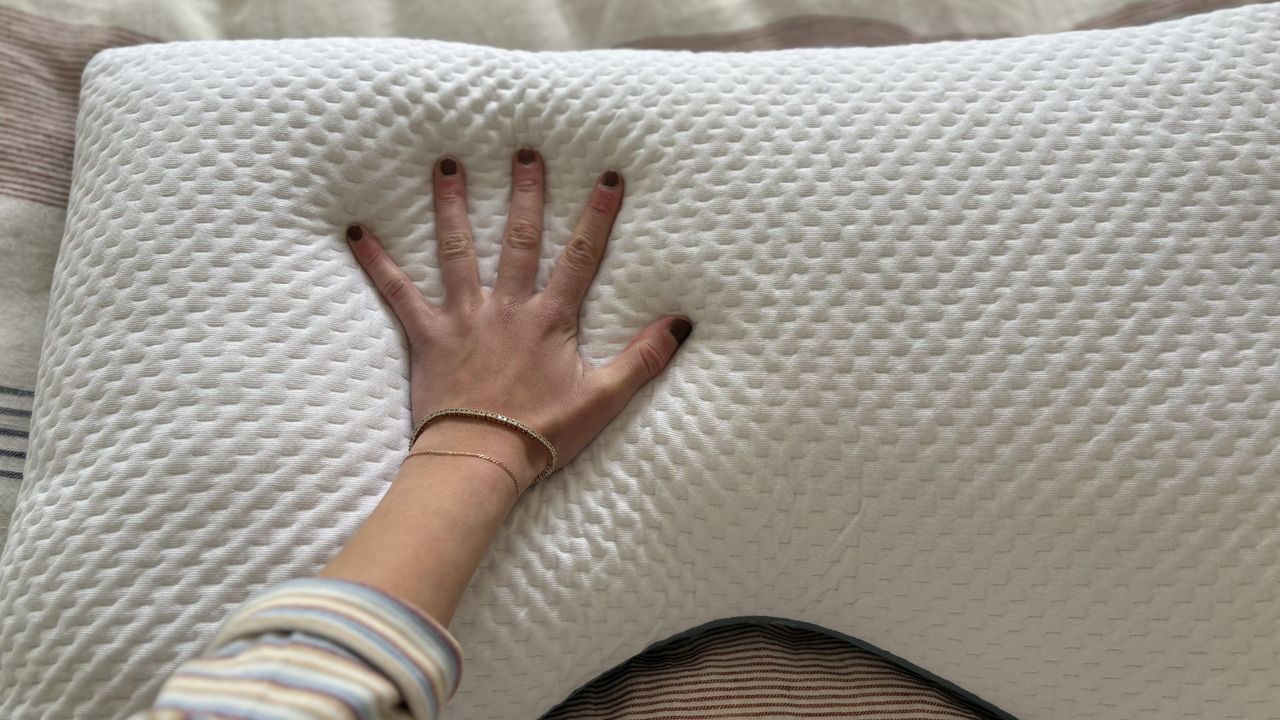 Testing the Eli &amp; Elm Ultimate Side Sleeper Pillow, showing it on the bed