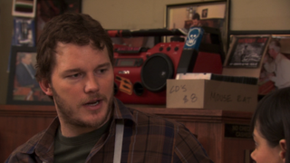 Chris Pratt talking to Aubrey Plaza in Parks and Rec