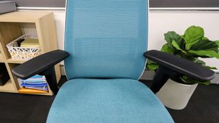 The pivoting armrests of the Steelcase Personality Plus office chair