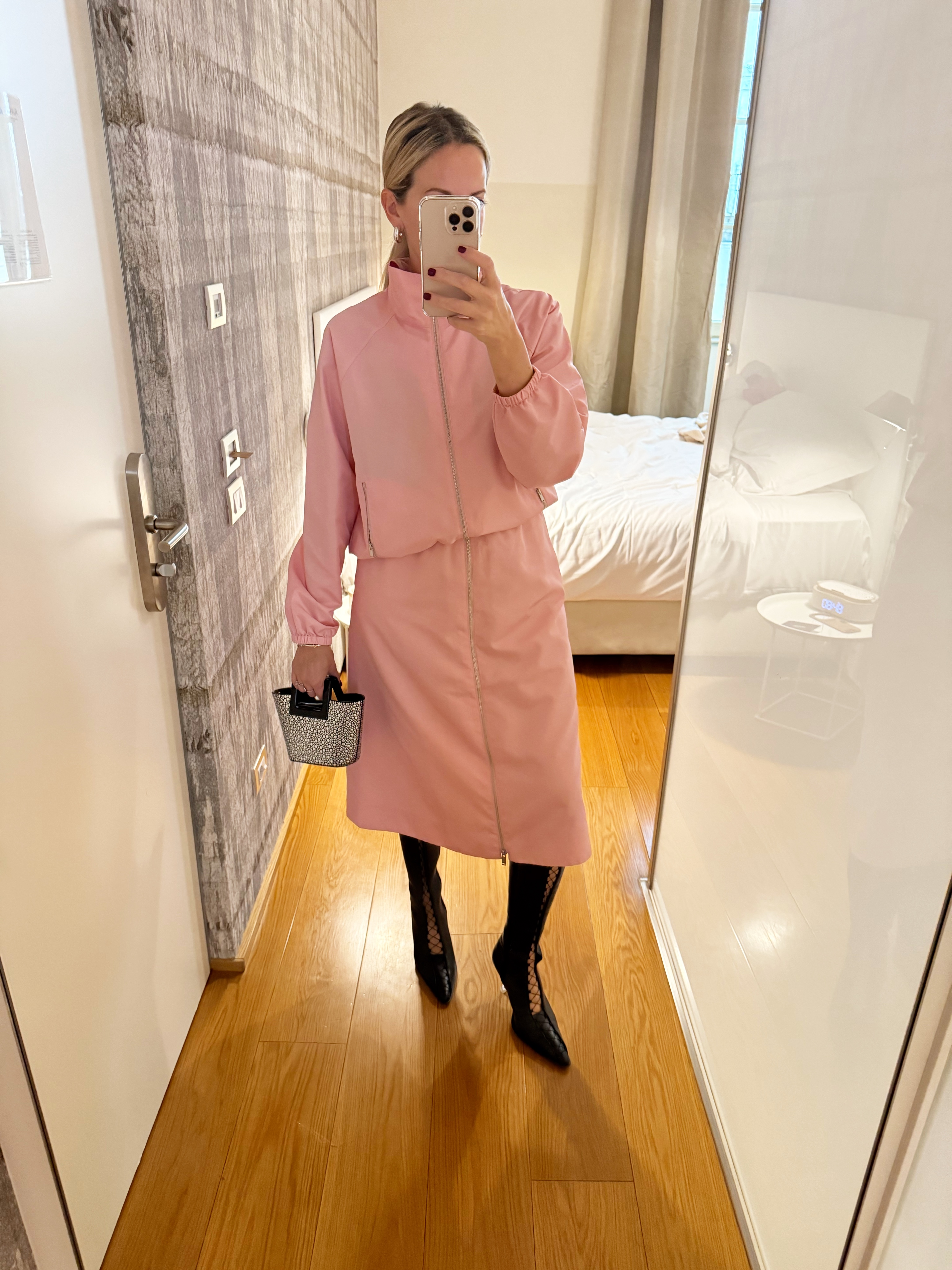Lily Russo-Bah wearing a technical bomber jacket