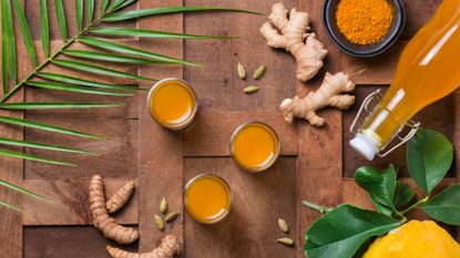 ginger shots on a wooden board