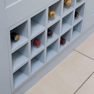 blue wine rack on tiled flooring