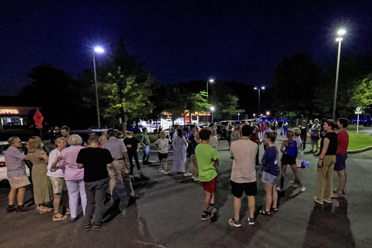 Church members gathering for prayer circle.