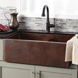 A copper textured kitchen sink from Native Trails